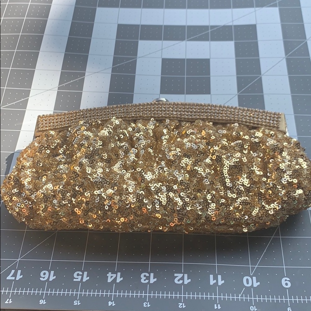 Gold sequin clutch purse